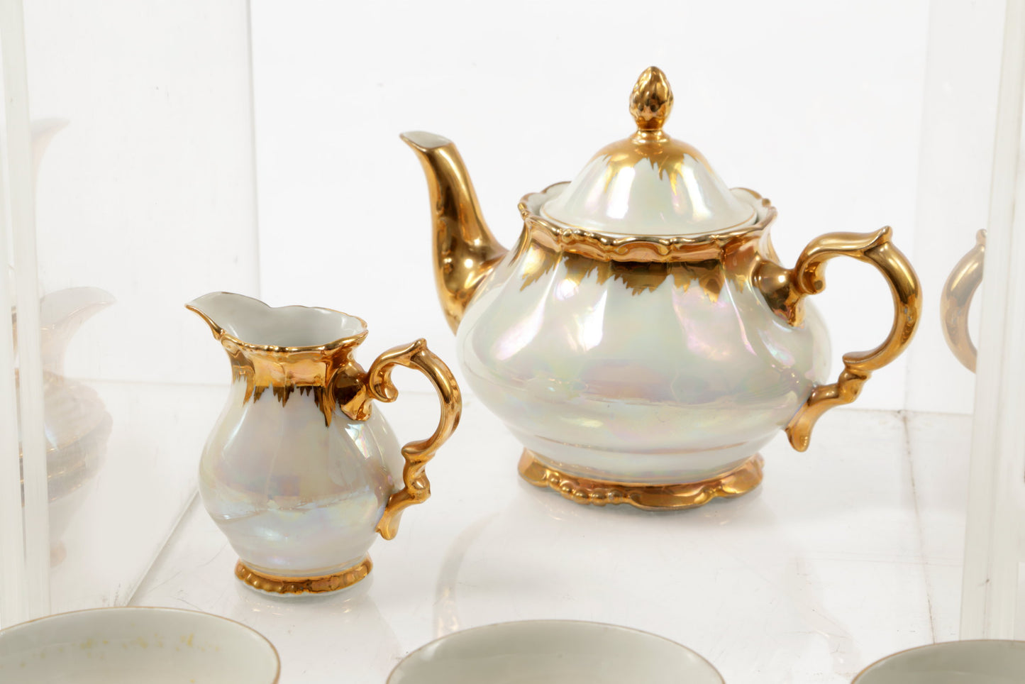 Porcelain tea service with gold flaming