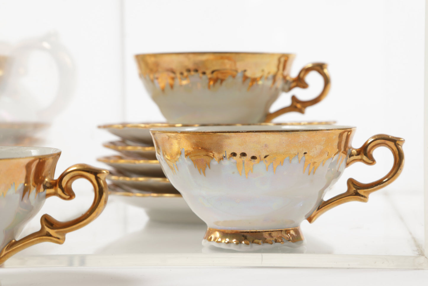 Porcelain tea service with gold flaming