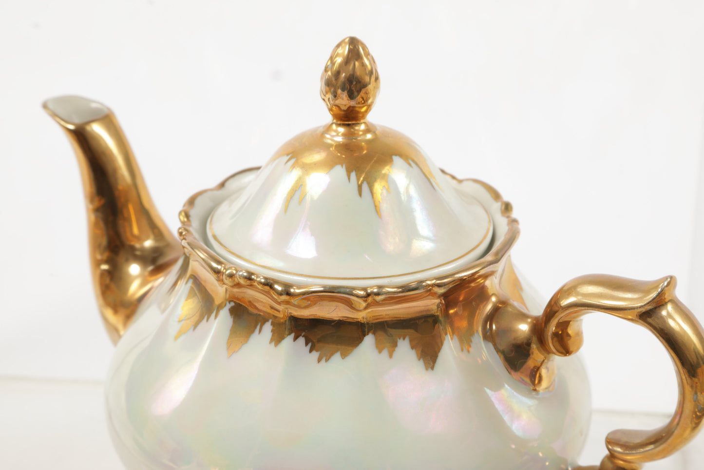 Porcelain tea service with gold flaming