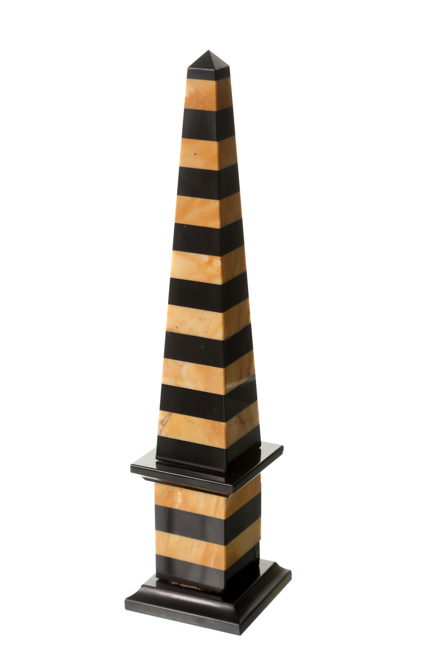 Yellow and black marble obelisk