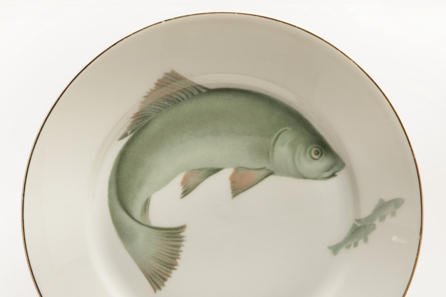 Porcelain dinner set with jade green fish from the 1940s