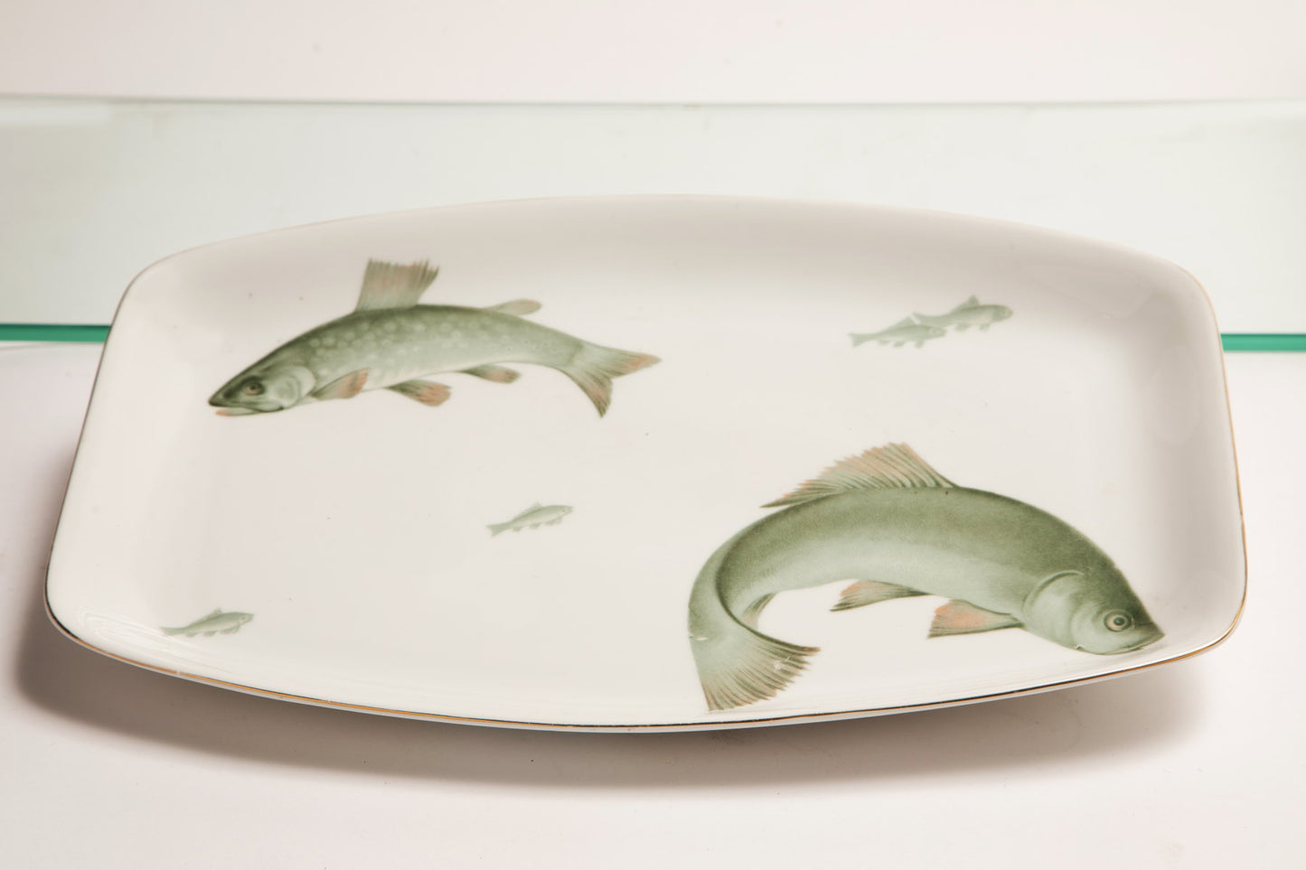 Porcelain dinner set with jade green fish from the 1940s