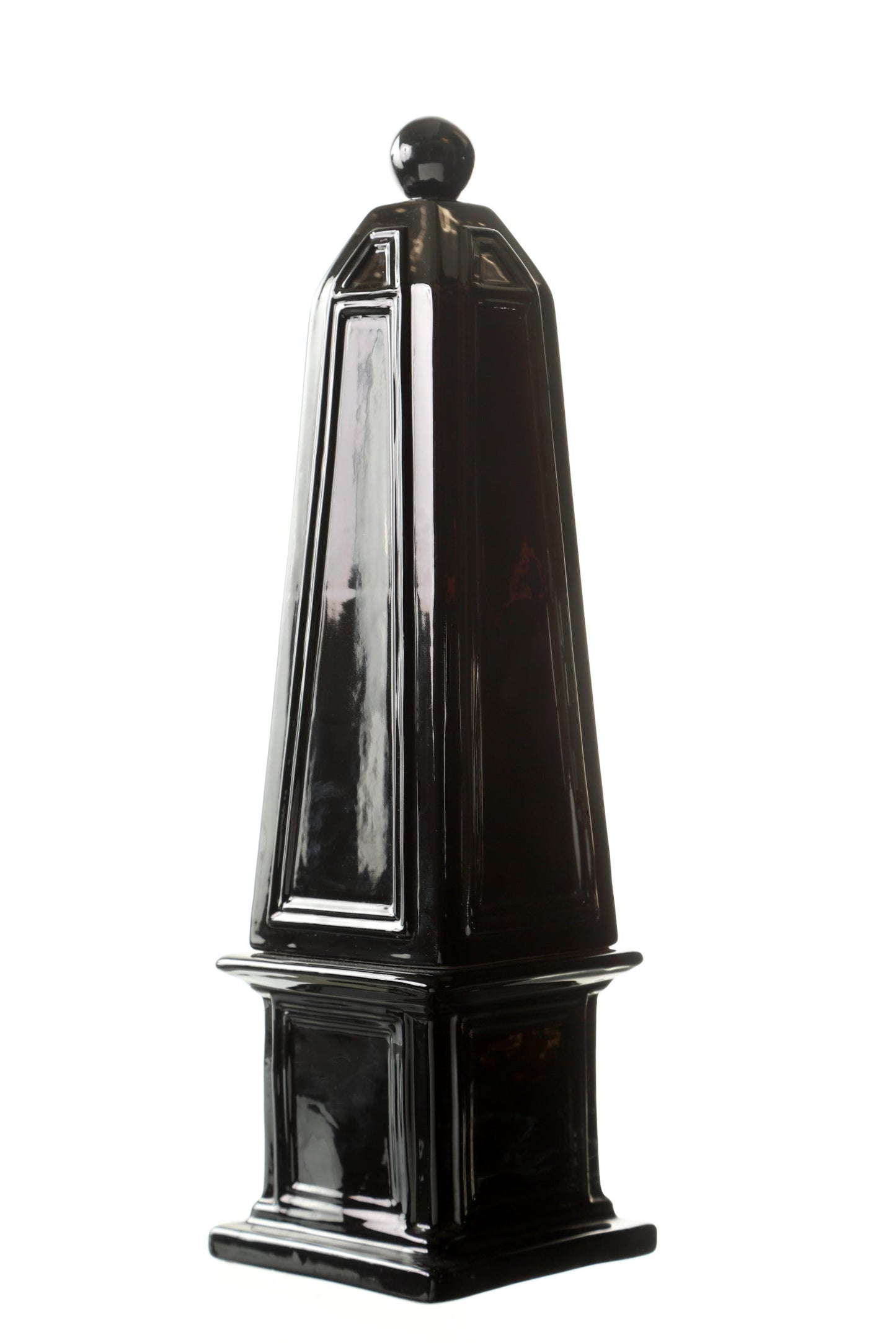 Pair of black ceramic obelisks