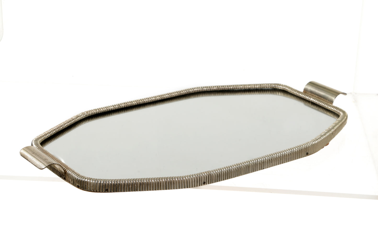 1960s mirrored tray with chrome edge