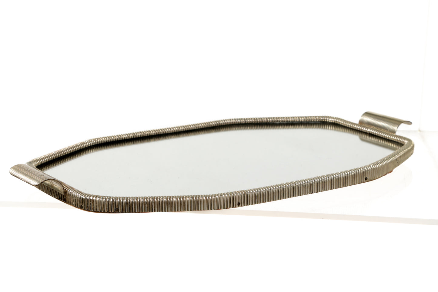 1960s mirrored tray with chrome edge