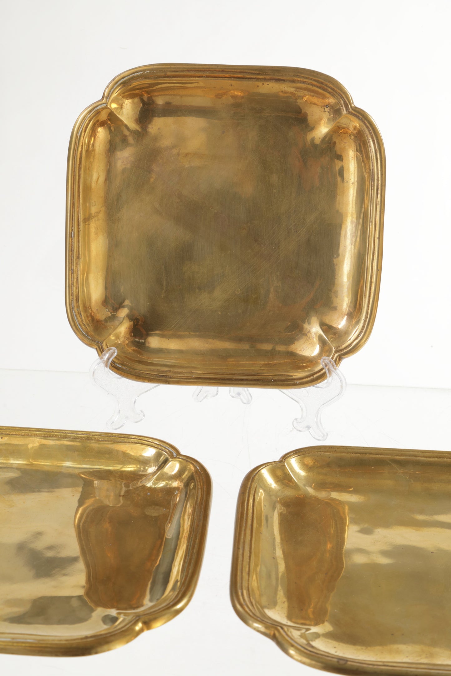 7 Solid brass saucers