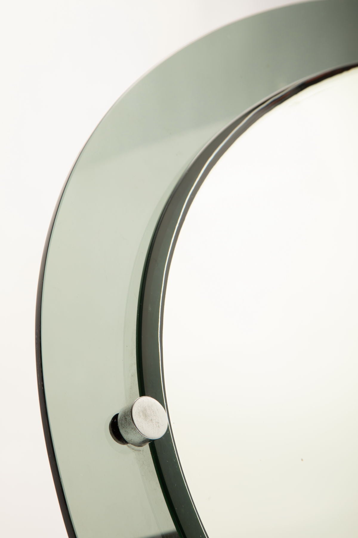Smoked edge oval mirror from the 70s