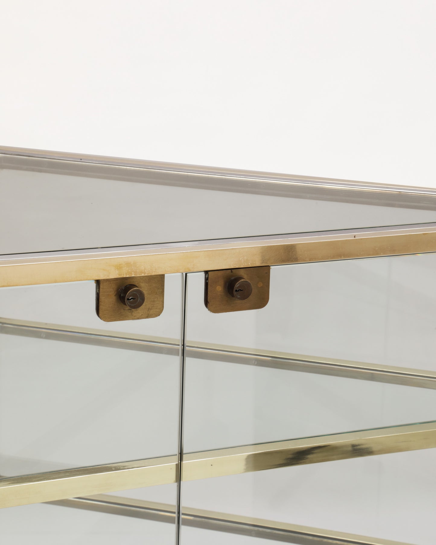 1970s corner brass display cabinet