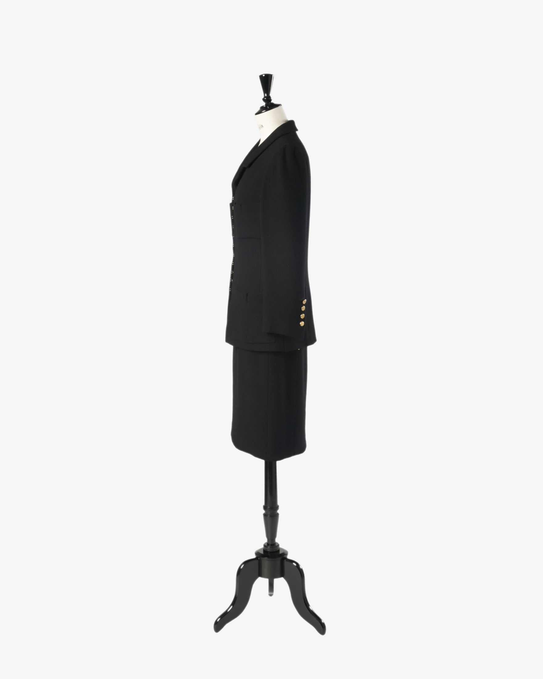 Black Chanel suit from the 90s