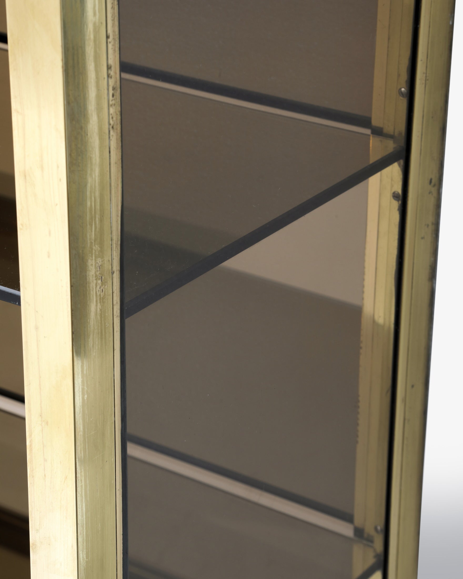 1970s brass and smoked glass display cabinet