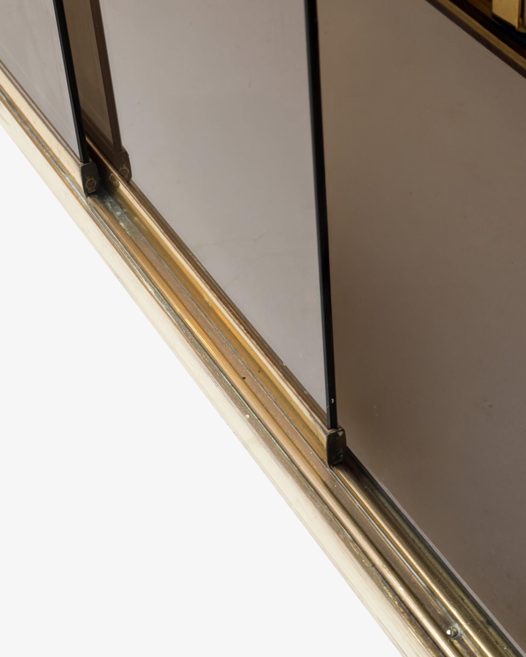 1970s brass and smoked glass display cabinet