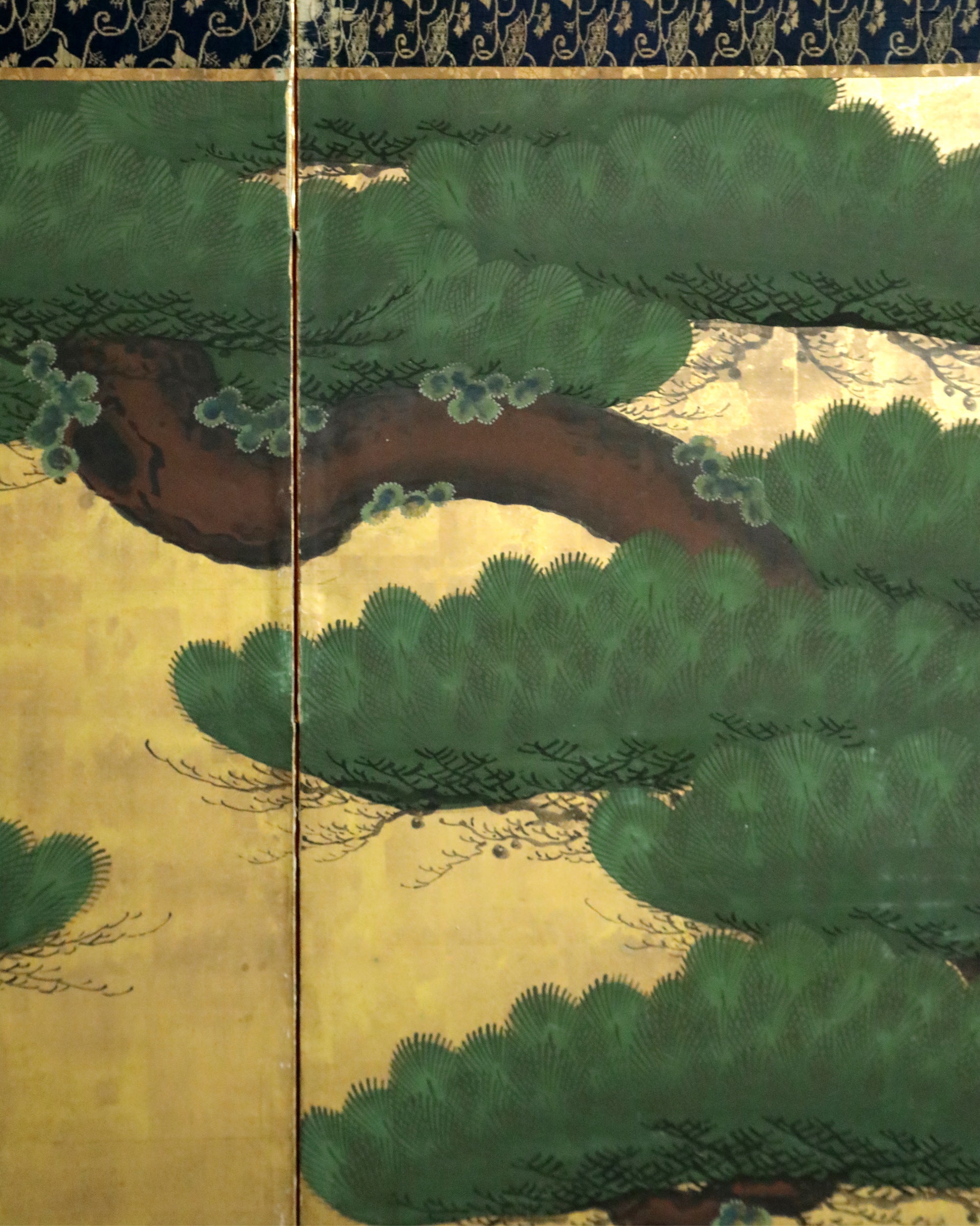 Japanese six-panel Byōbu Matsu-ni-Kinji screen with pines on a gold ground
