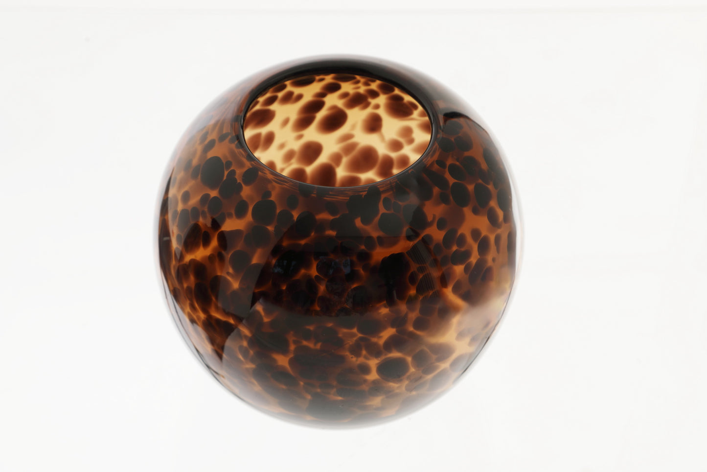 Spherical vase from the 70s in spotted glass