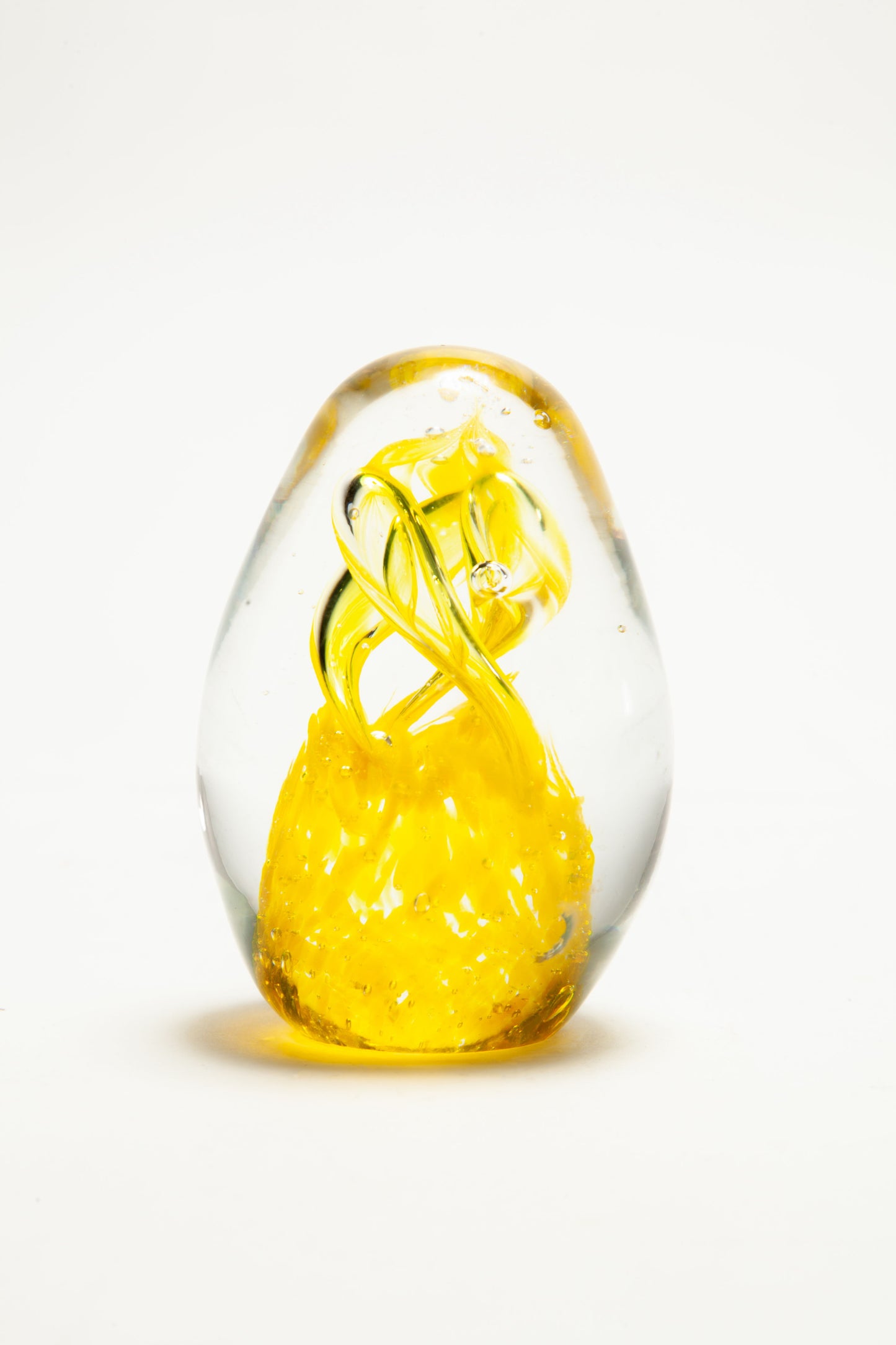 Murano glass paperweight with yellow decoration
