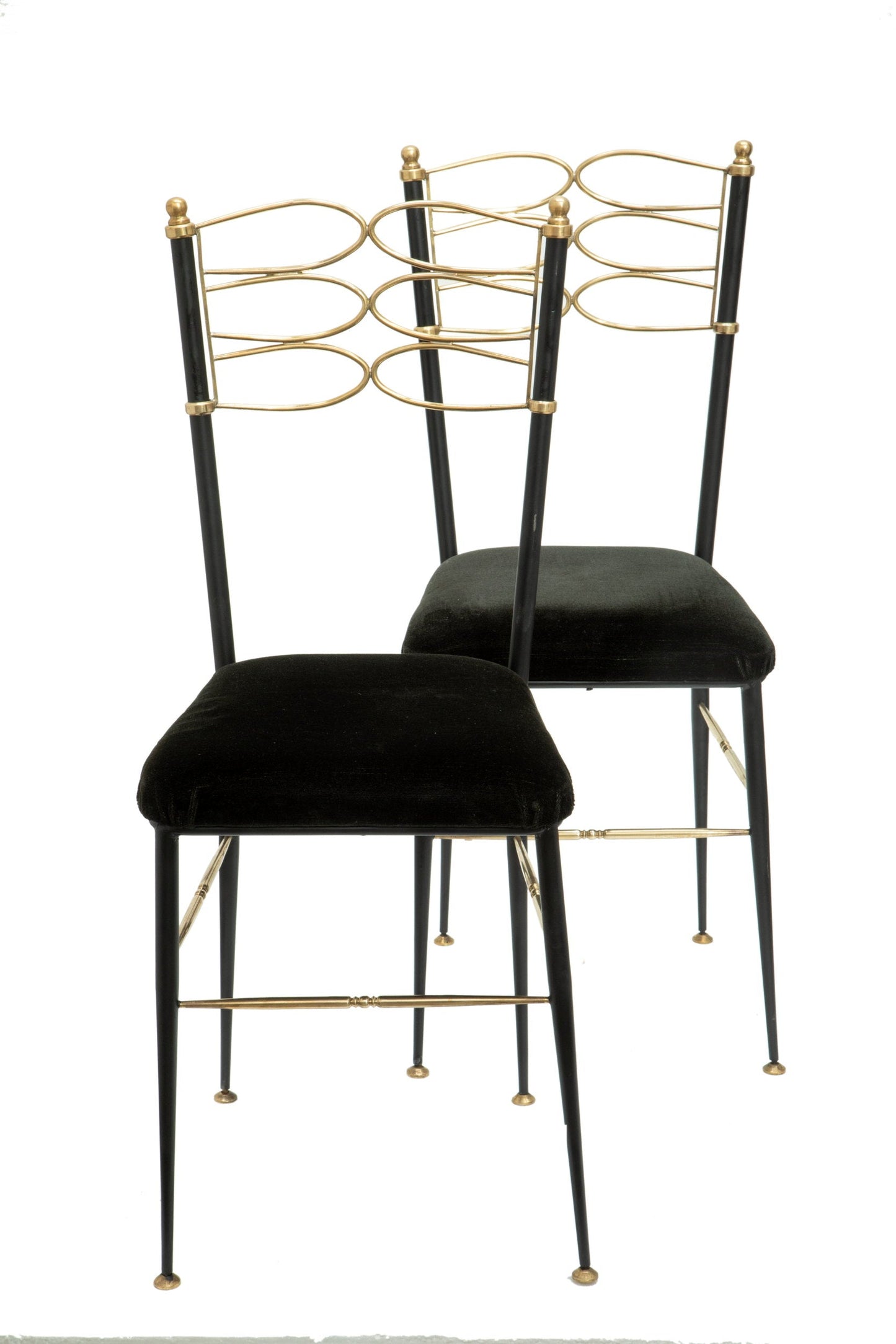 Four 1950s iron and brass chairs