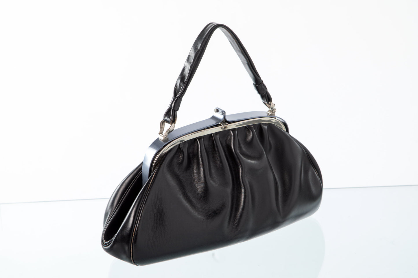 Black leather handbag and shoulder bag from the 50s