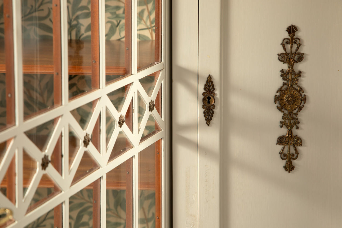 Ivory lacquered display cabinet from the 1950s