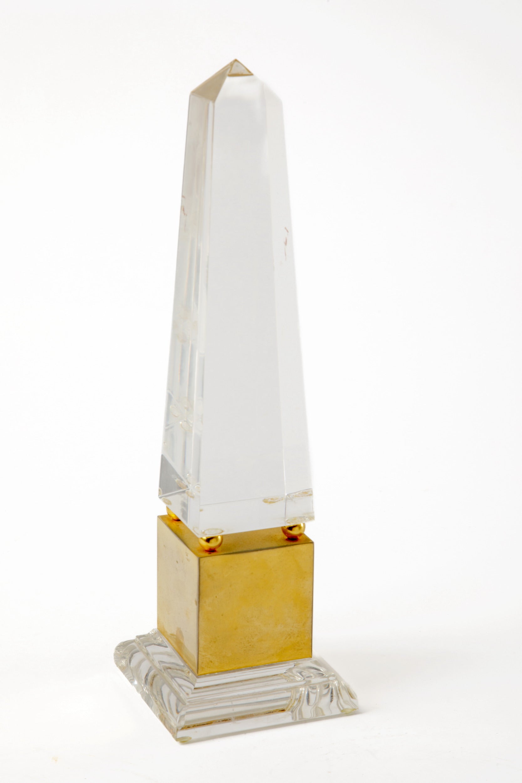 Plexiglass and brass obelisk from the 1970s