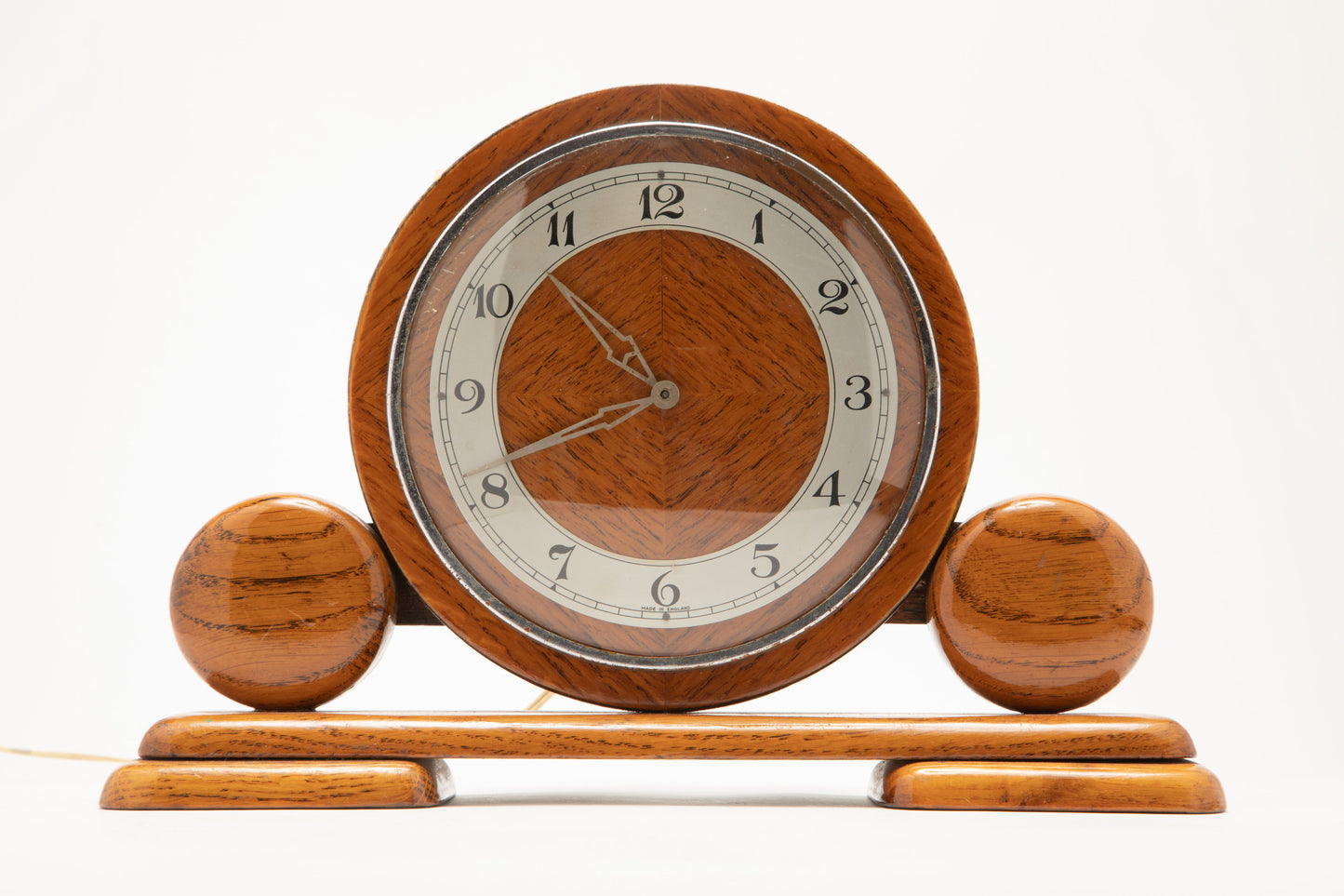 Blond table clock from the late 40s