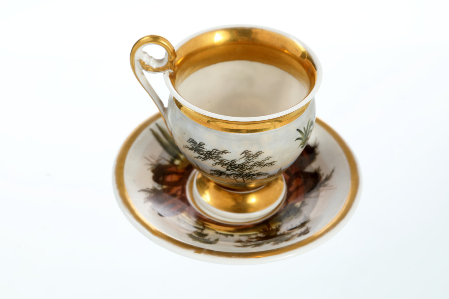 Small hand-painted porcelain cup from the 1800s