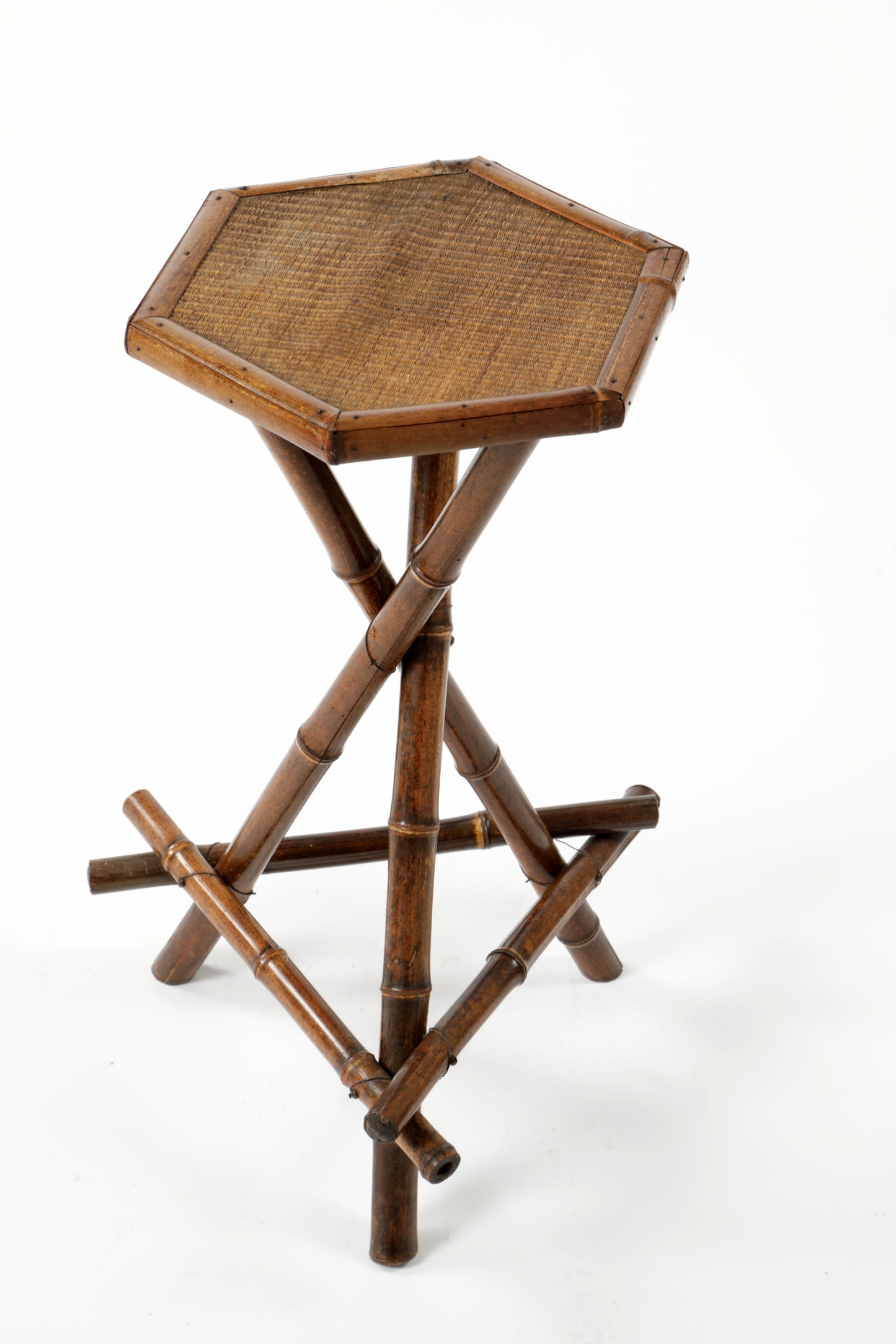 Small hexagonal bamboo table from the 70s