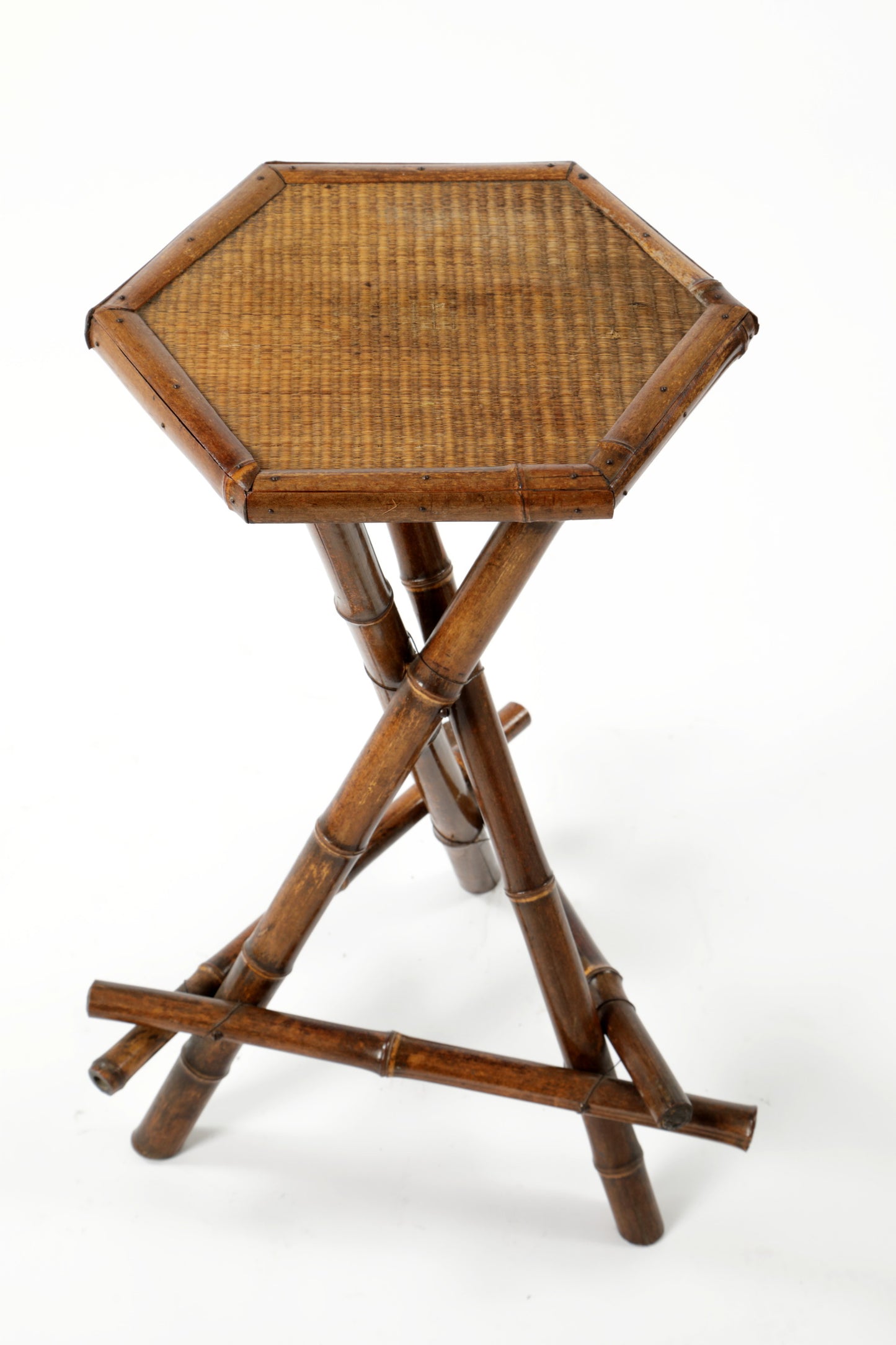 Small hexagonal bamboo table from the 70s