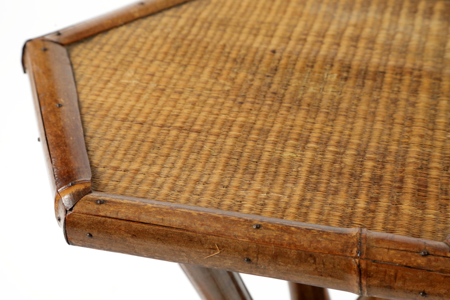 Small hexagonal bamboo table from the 70s