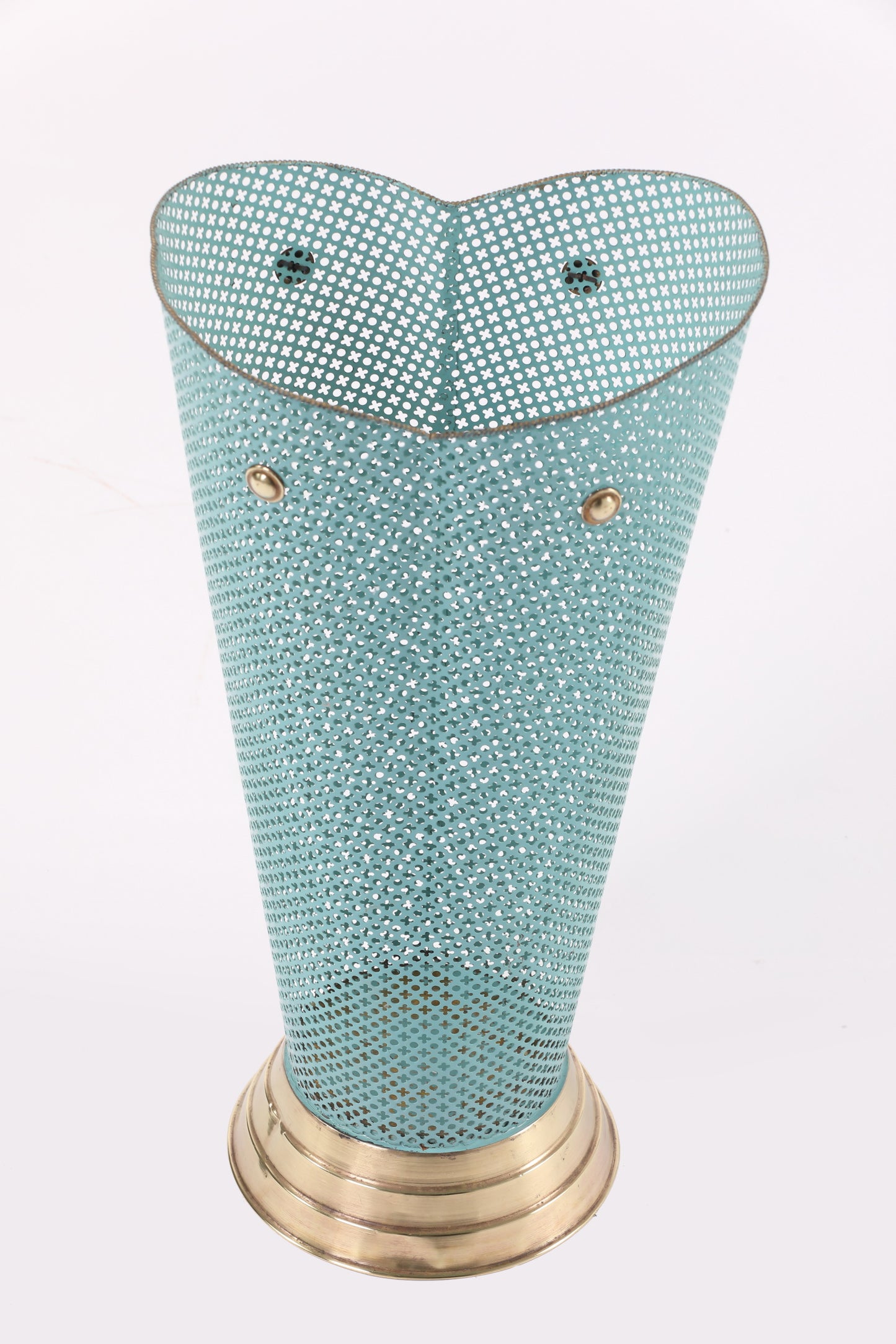 Perforated umbrella stand from the 50s