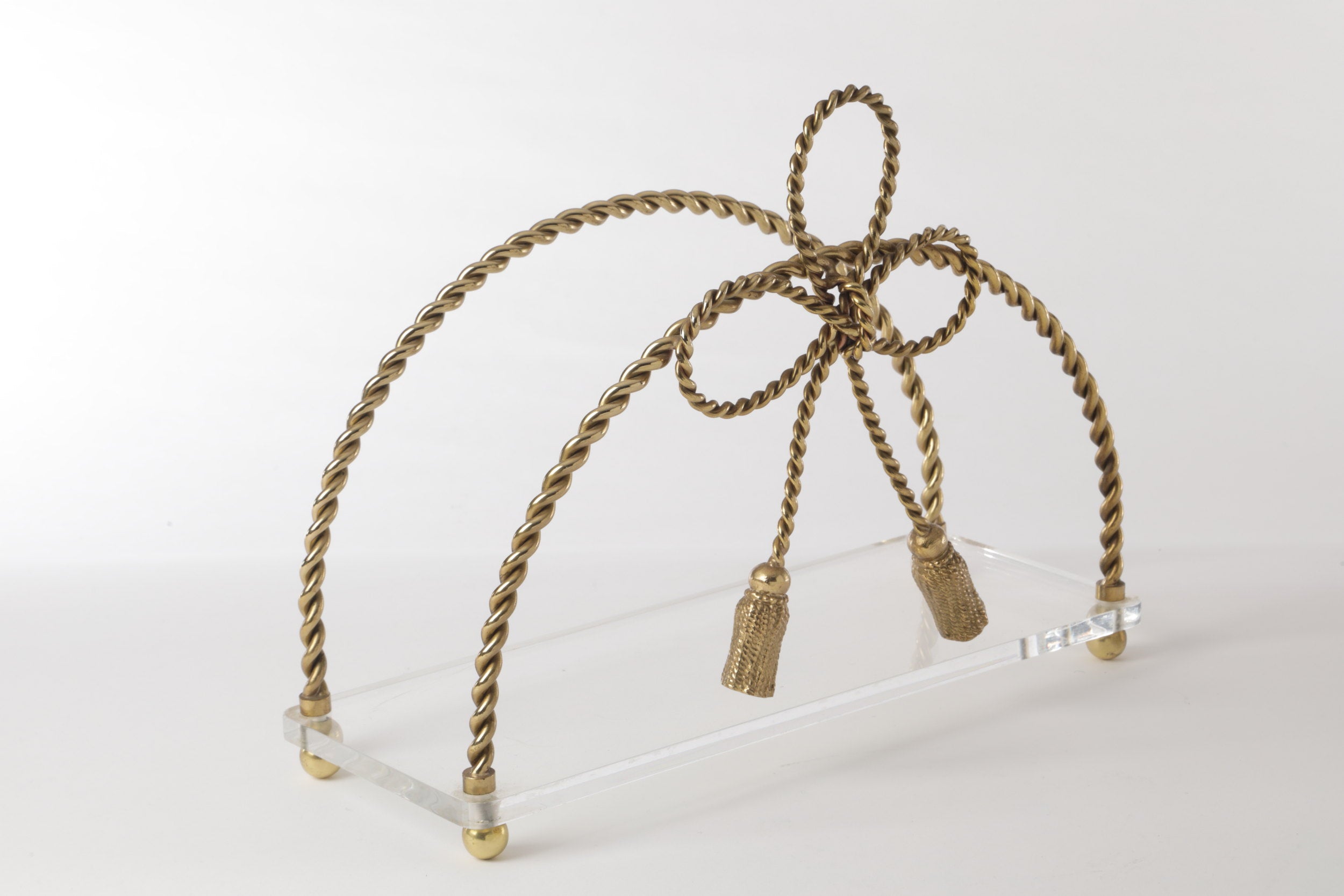 Brass and plexiglass magazine rack from the 70s