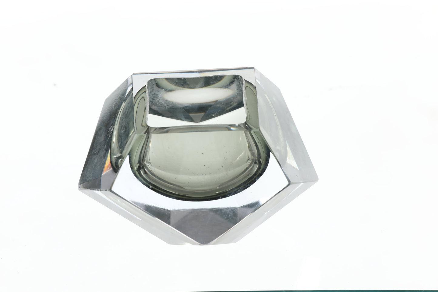Faceted submerged glass ashtray