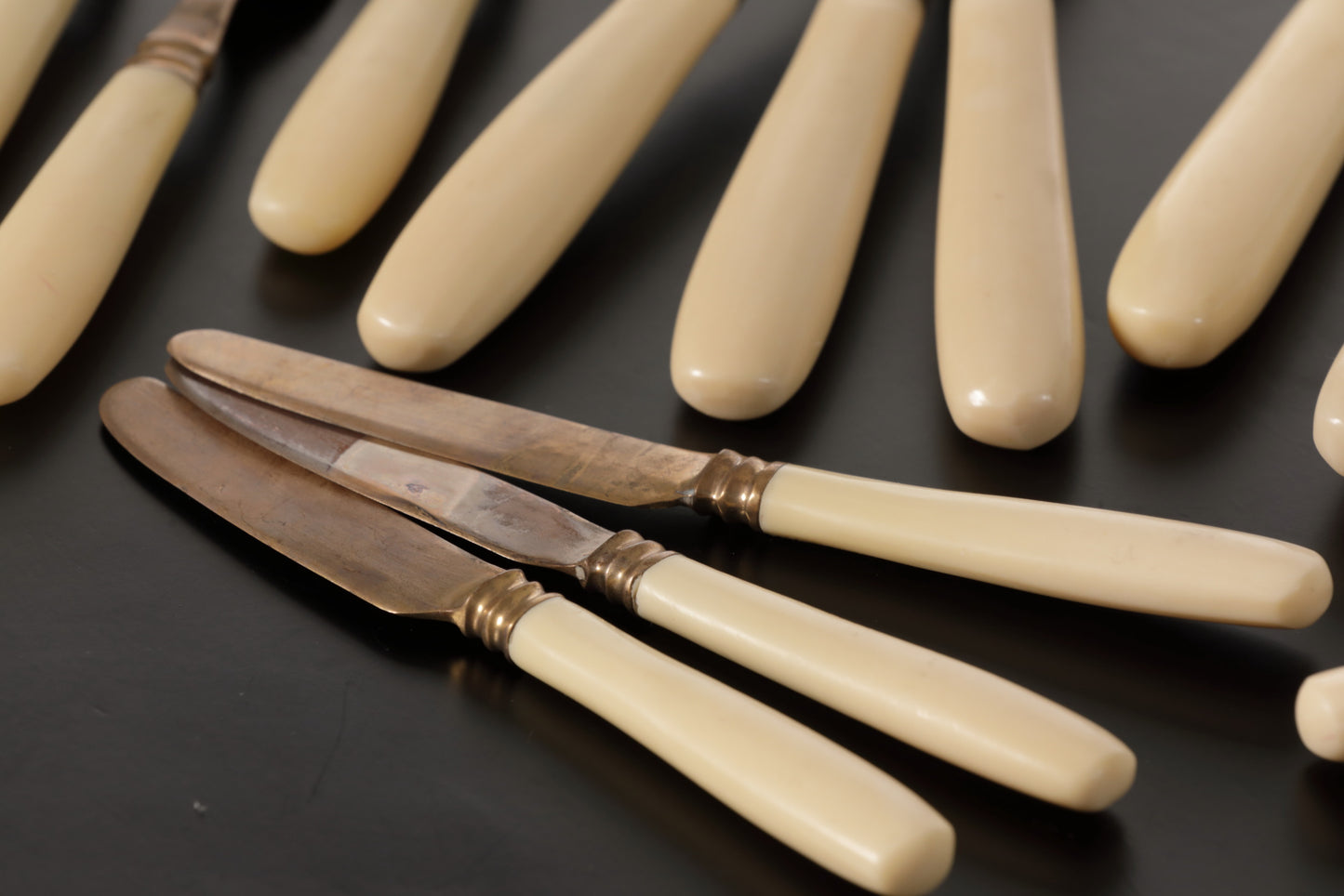 1970s brass and ivory bakelite cutlery