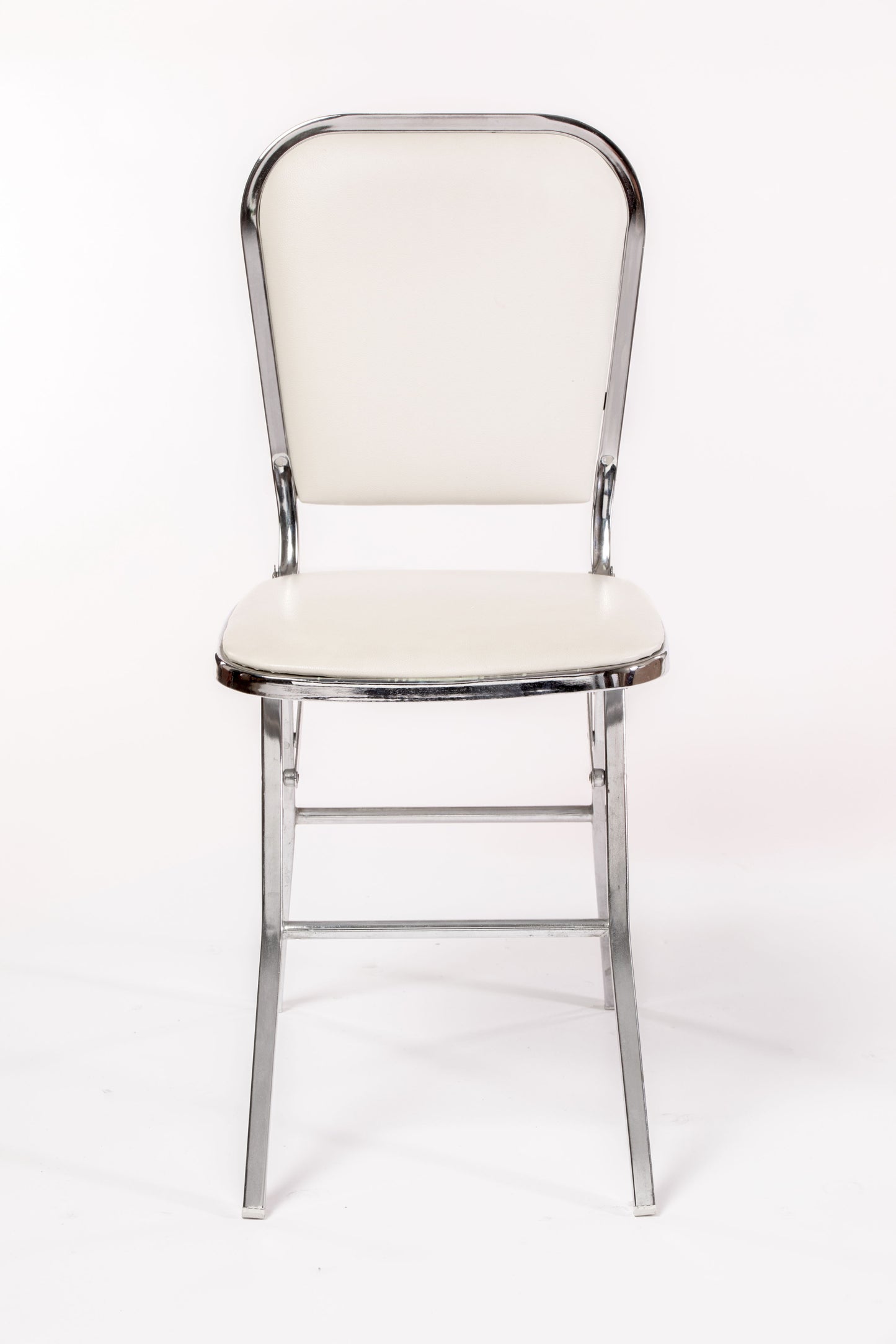 Four white leather folding chairs from the 70s