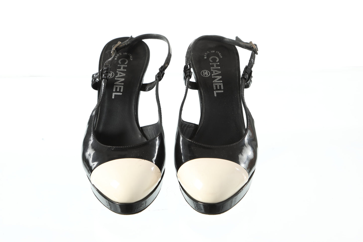 Black Chanel sandal with white upper