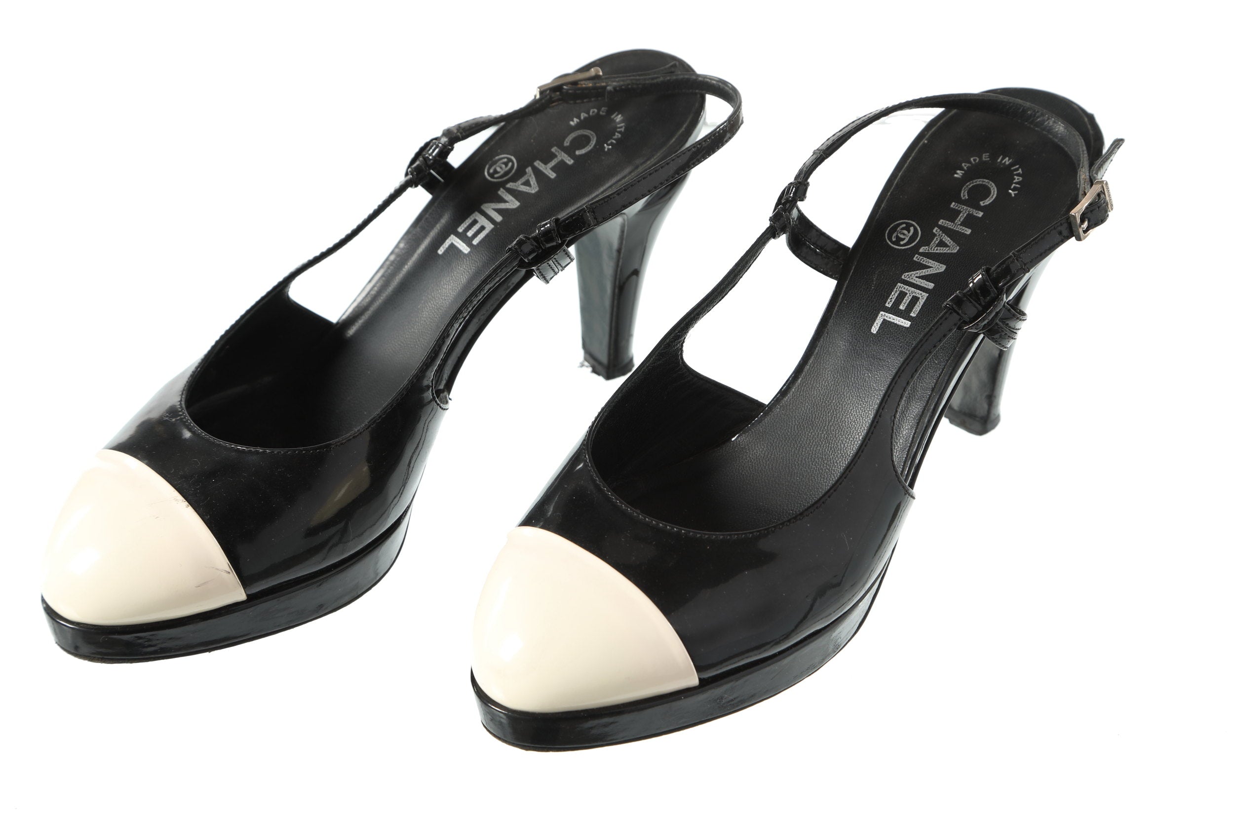 Black Chanel sandal with white upper