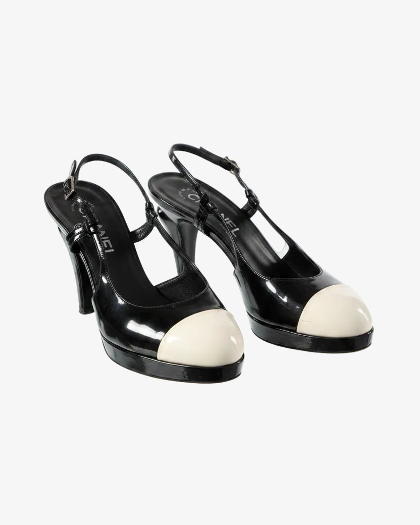 Black Chanel sandal with white upper