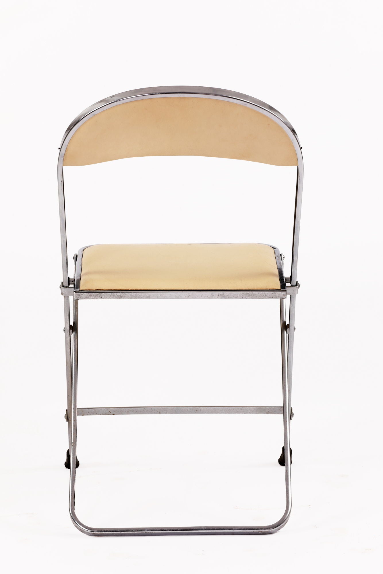 Six 70s steel and leather folding chairs