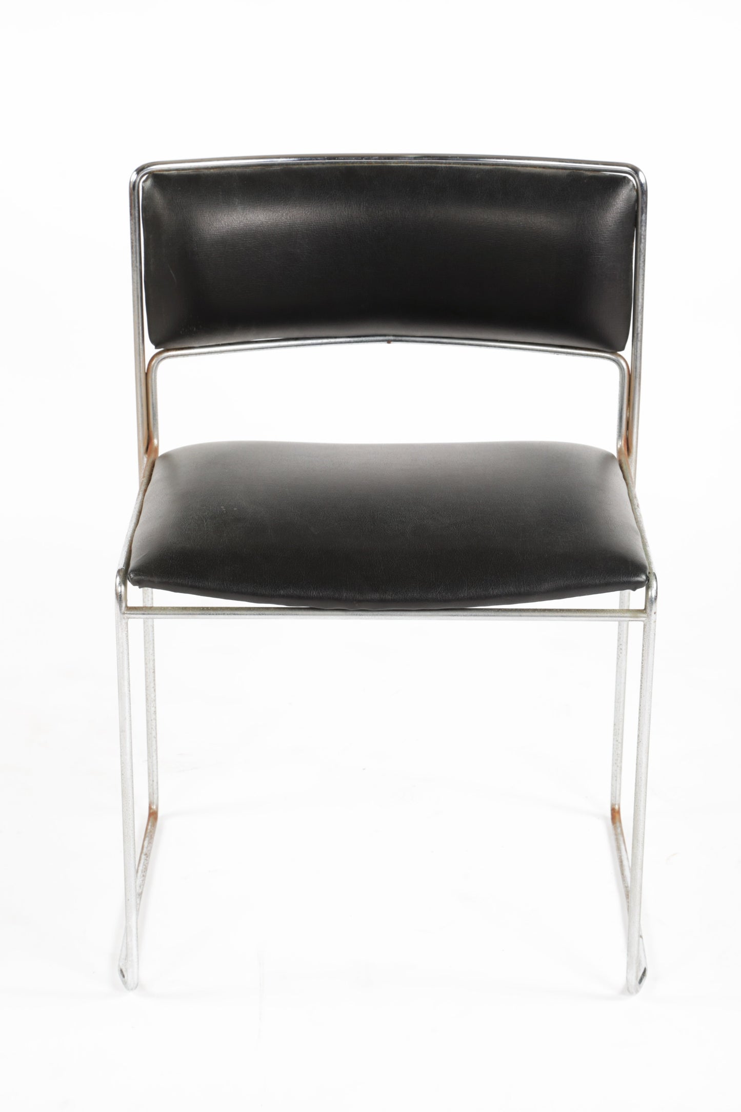 Six black leather chairs