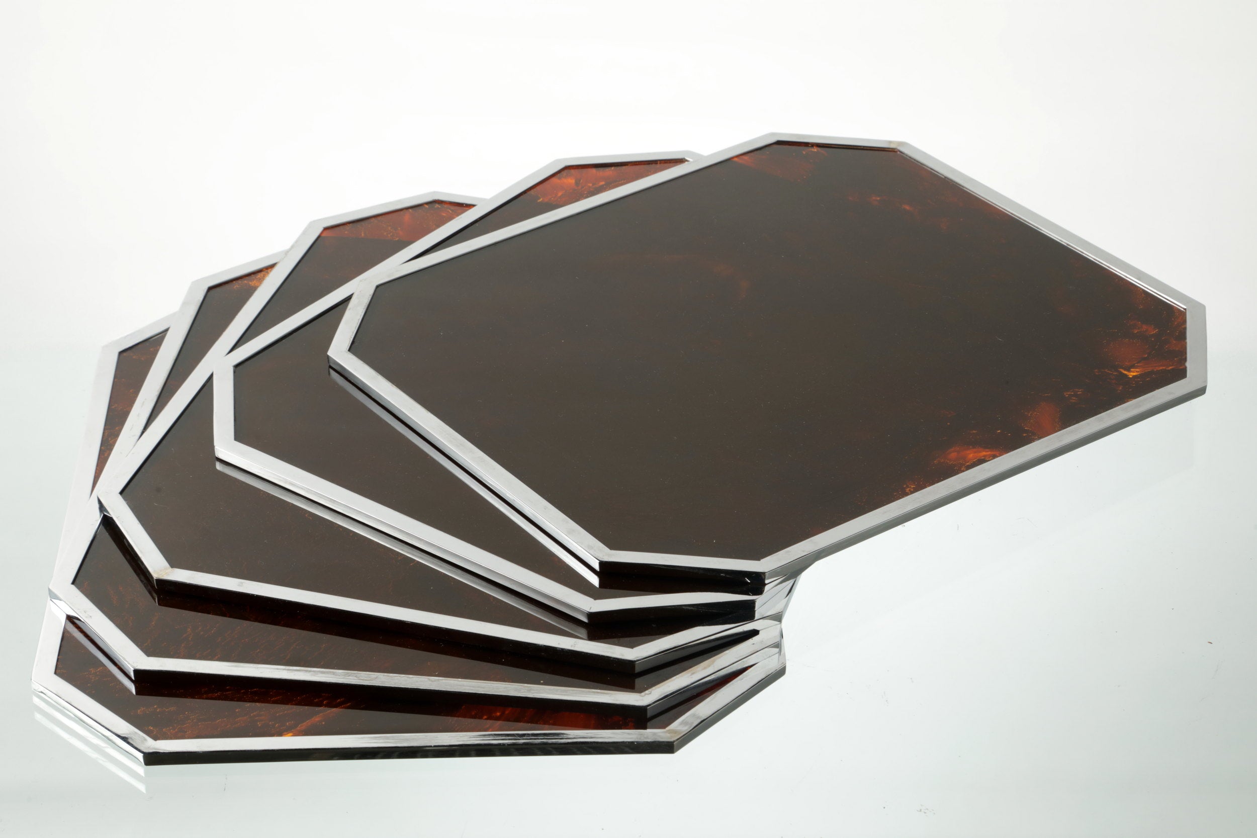 Six 1970s placemats in steel and lucite