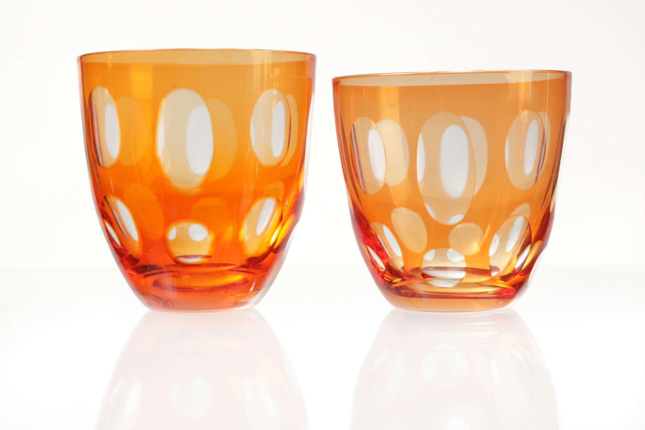Orange crystal glass set with sphere motif