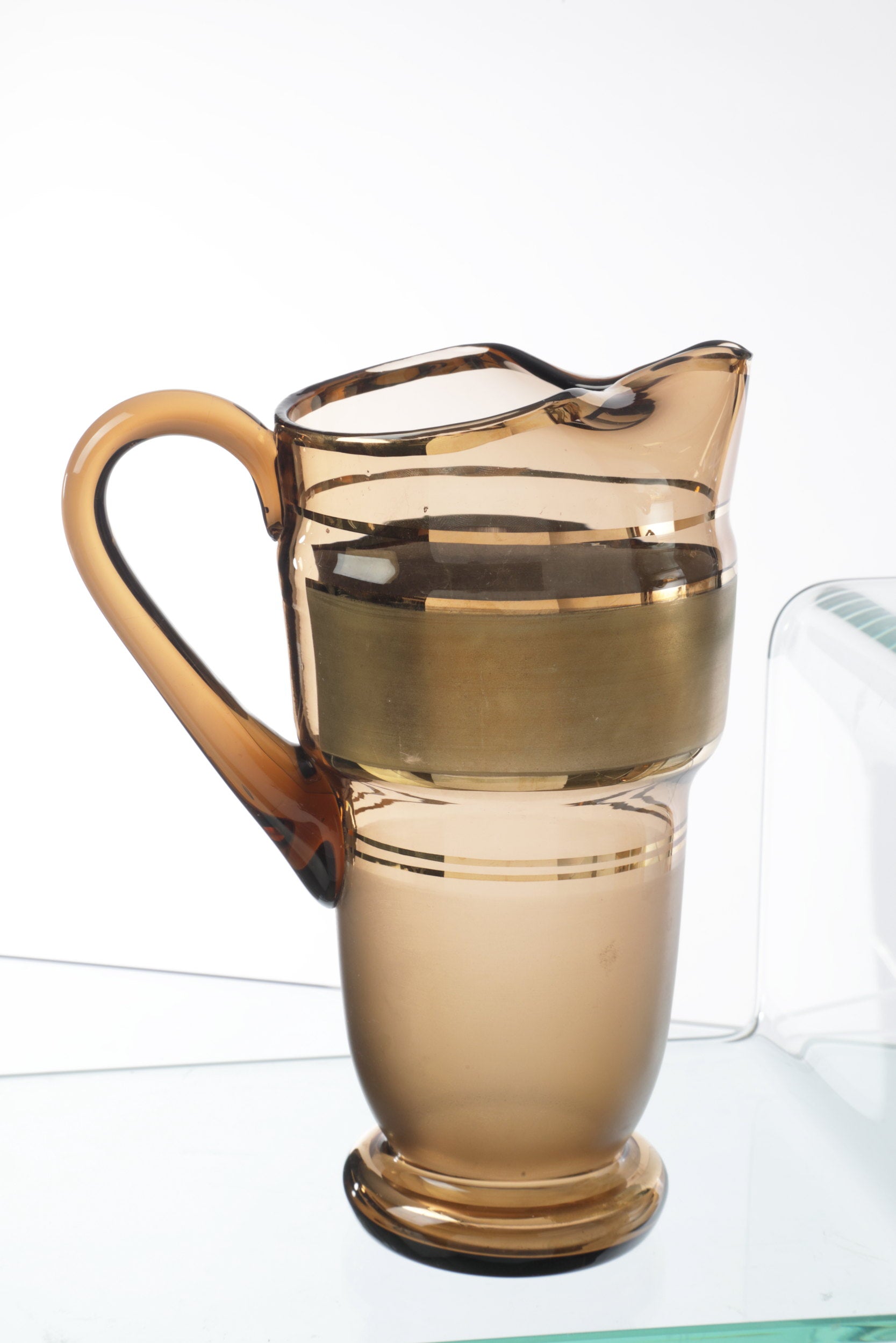 Pitcher set with six smoked glass glasses