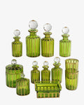 Set di bottiglie porta profumo in vetro verde e oro anni 60
