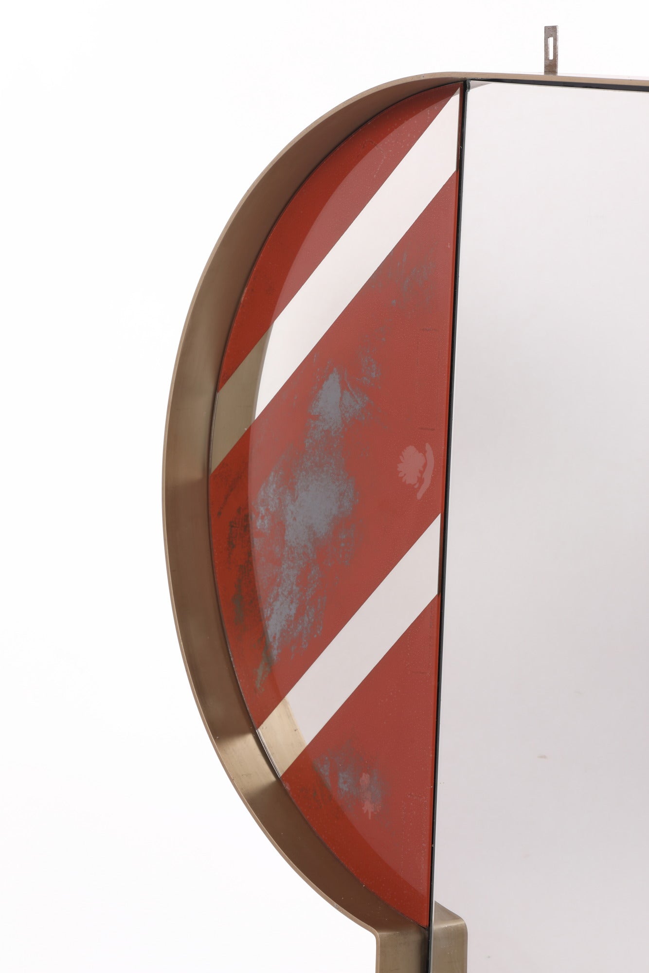 Mirror from the 70s in steel with red band inserts