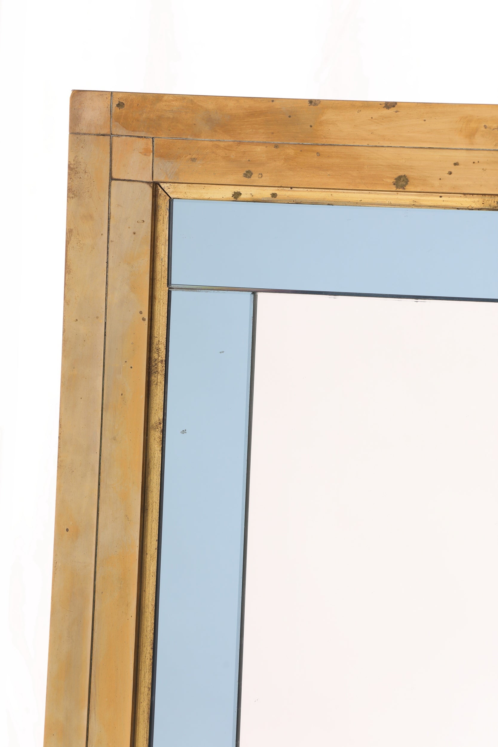 Specchiera anni 70 in ottone profili vetro azzurro