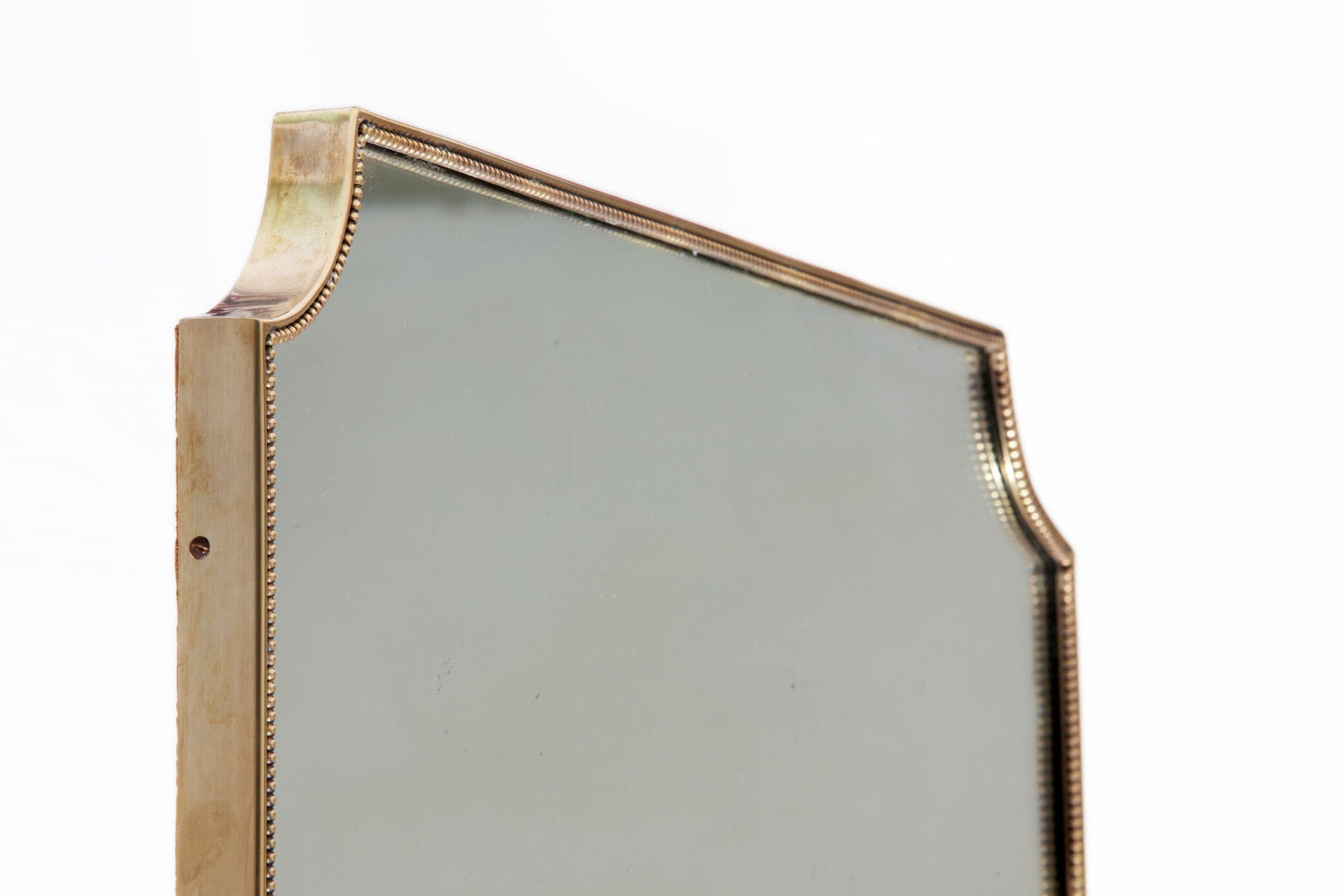 1950s brass mirror with cut corners