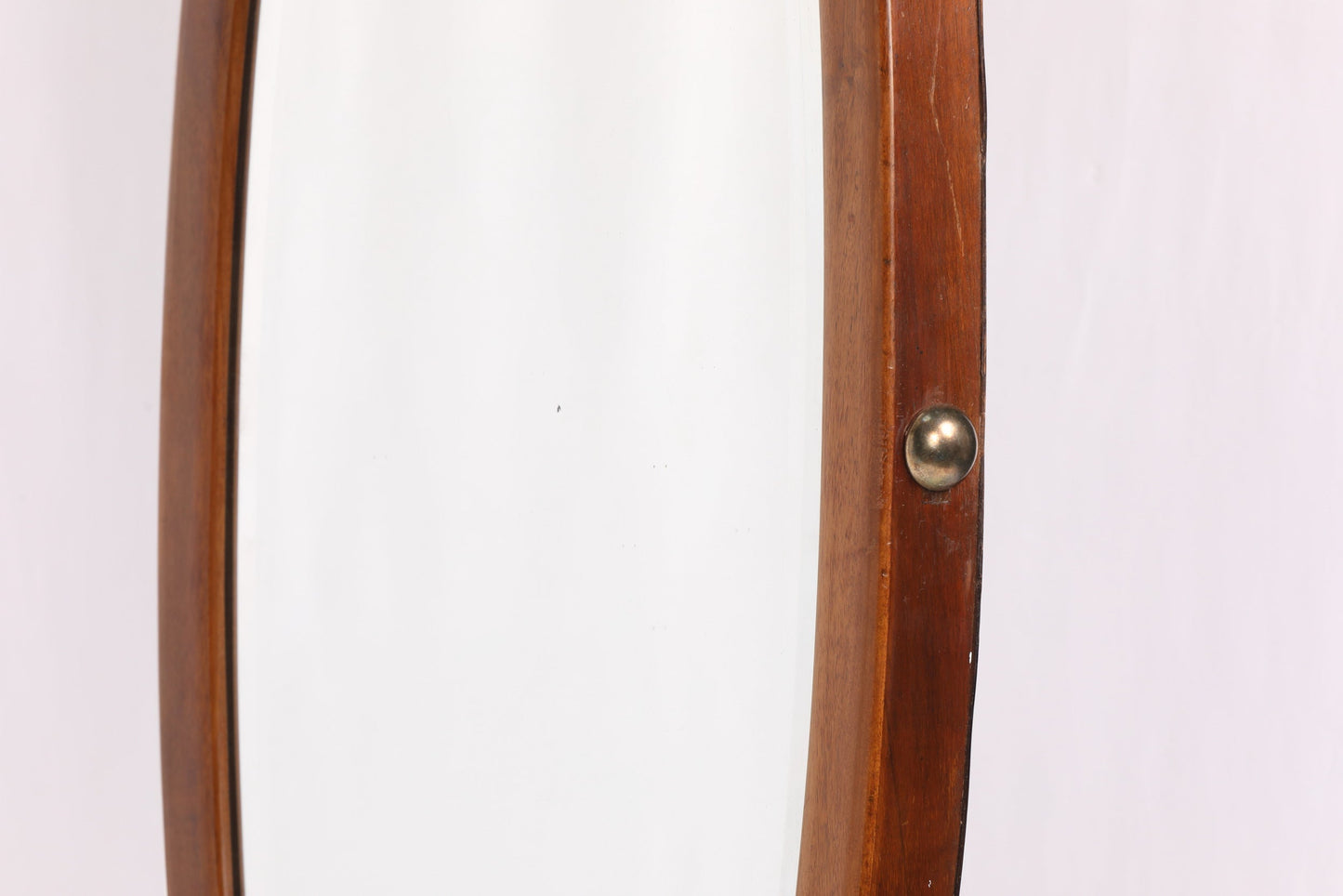 Large oval teak and brass mirror from the 70s