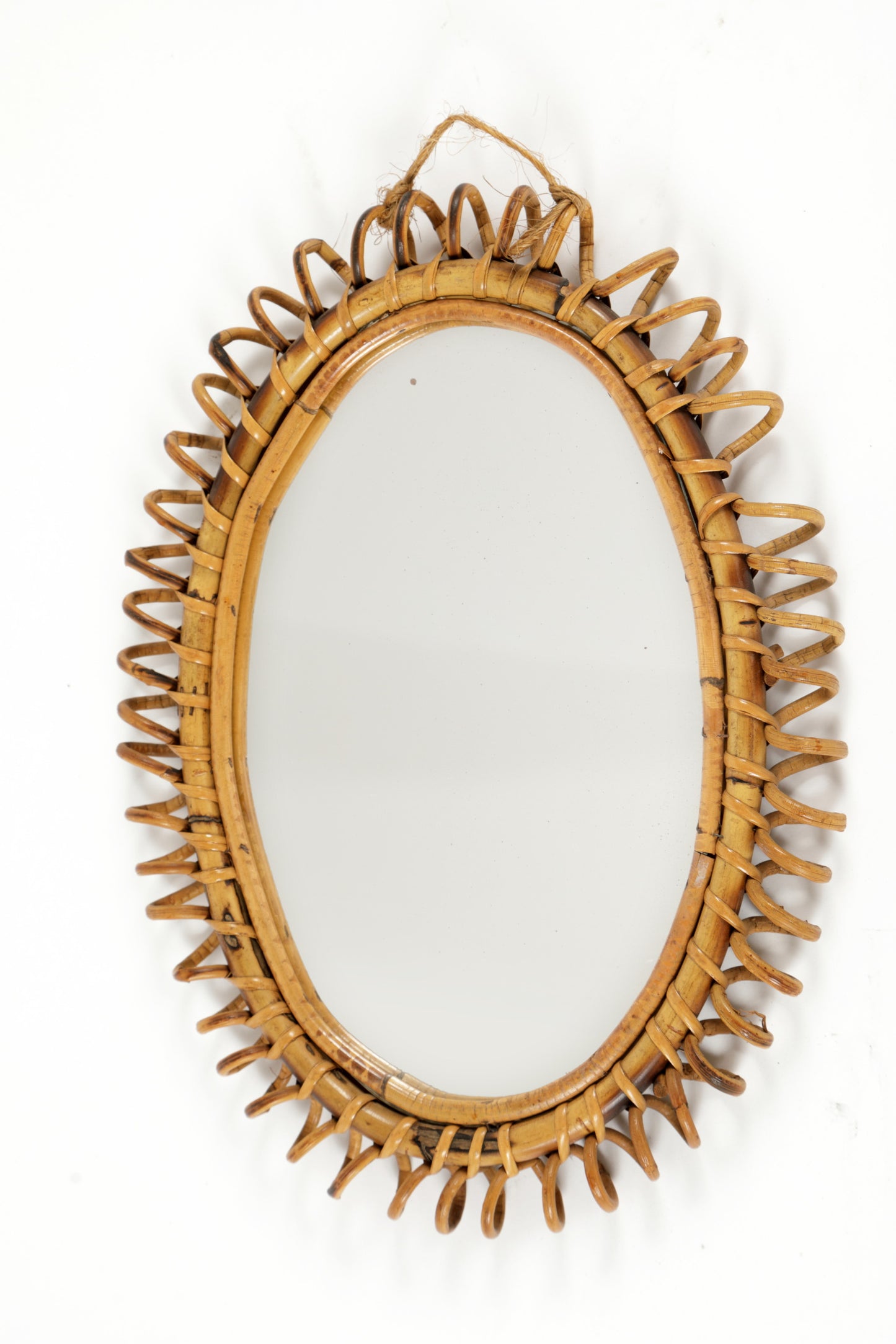 Oval natural rattan mirror from the 70s