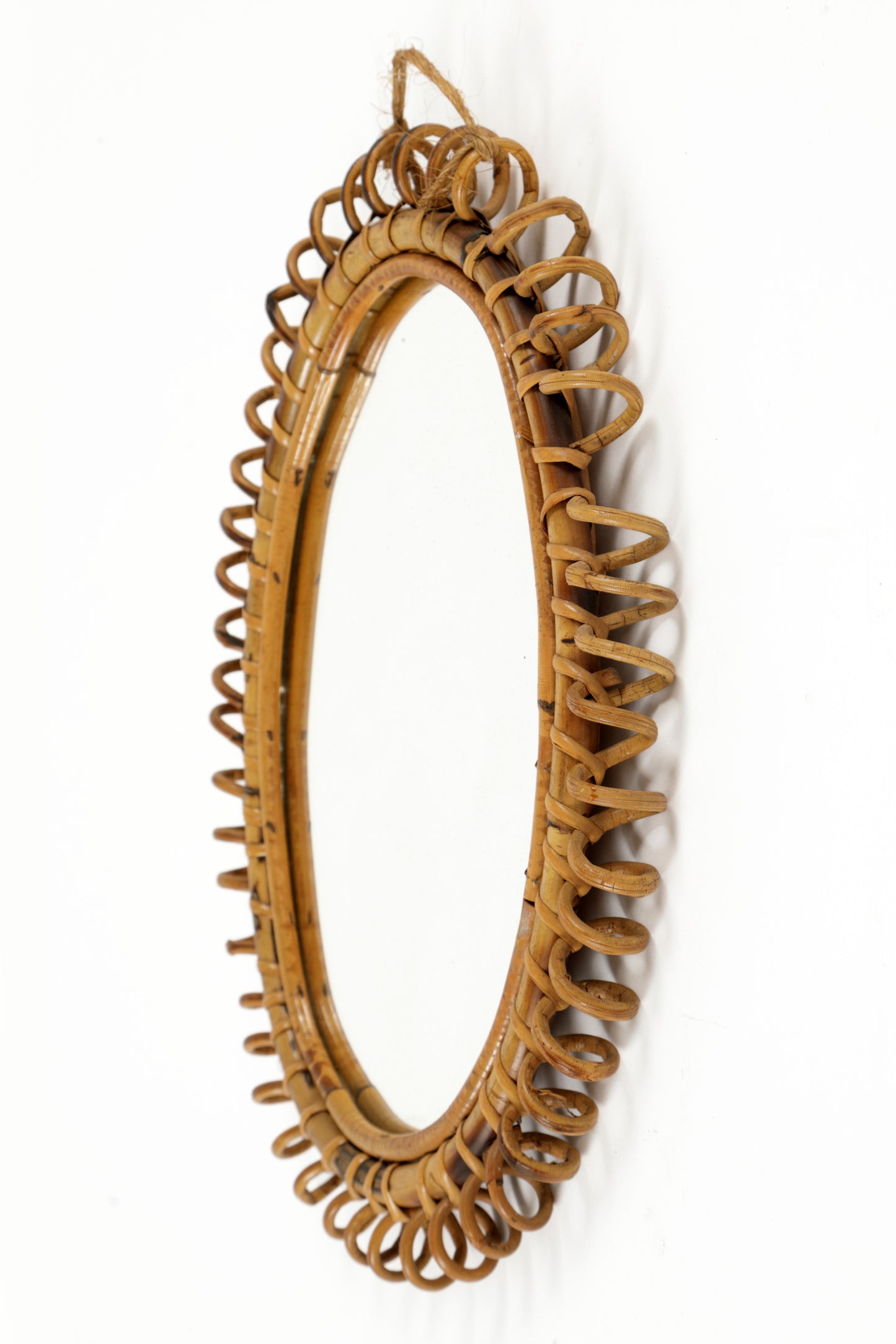 Oval natural rattan mirror from the 70s