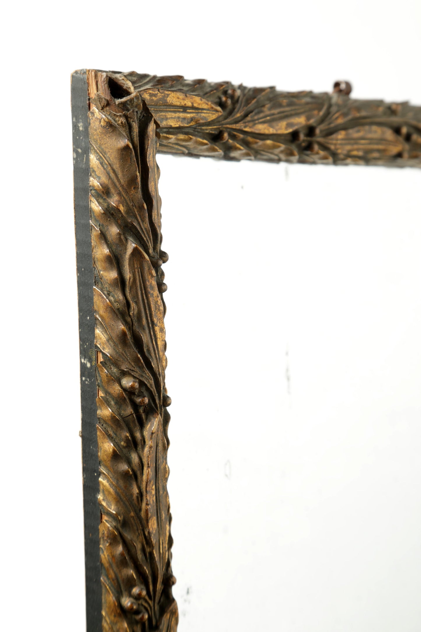 Mirror with golden frame and plaster paste leaves, early 1900s