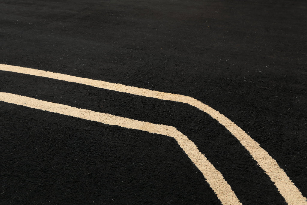 Tappeto Déco nero linee avorio