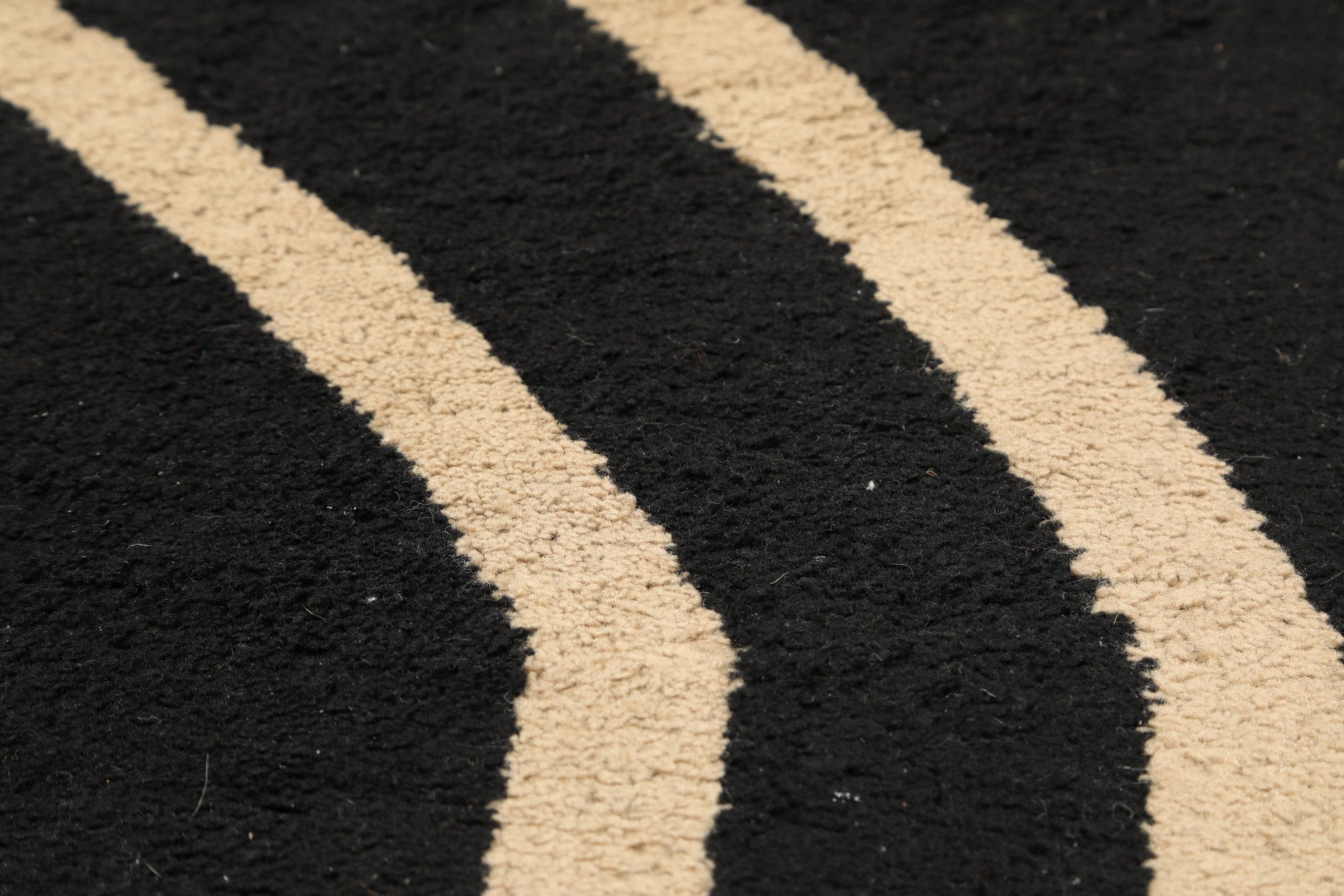 Black Deco carpet with ivory lines